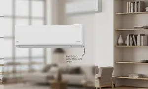 Un moderno aire acondicionado en la cocina, modelo ASY35UI-KN con WiFi, mantiene el ambiente fresco.