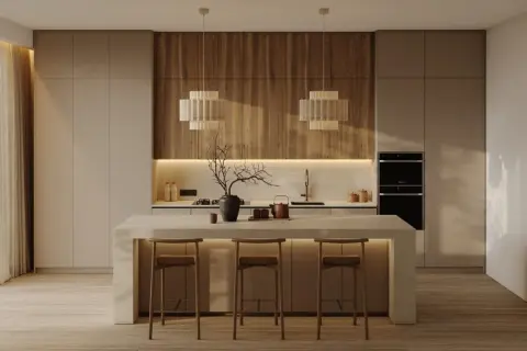 Cocina moderna con minimalismo cálido. Isla central con taburetes, encimeras de madera y luces tenues.