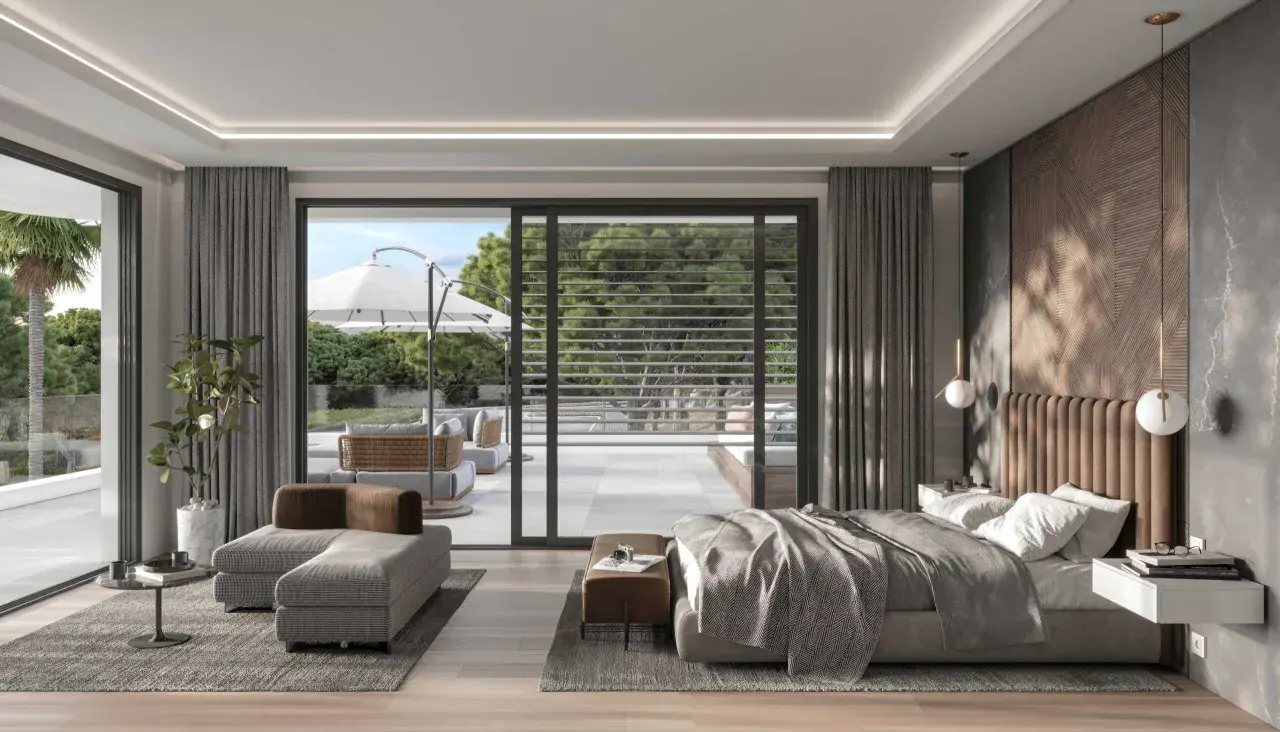 Dormitorio moderno con cama king, sofá, mesa auxiliar y acceso a terraza. La iluminación y distribución crean un ambiente de feng shui.