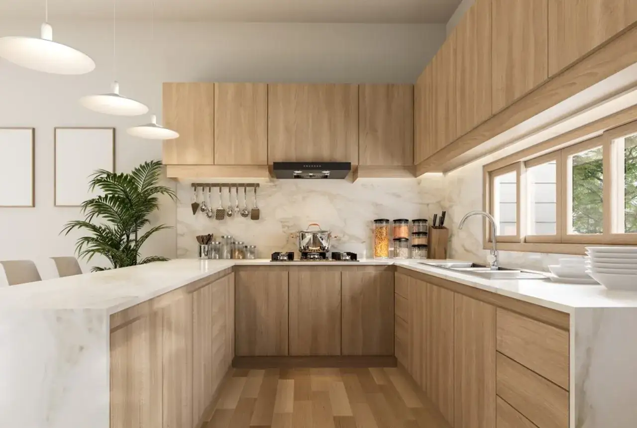 Cocina moderna con ventanal, gabinetes de madera clara y encimeras de m&aacute;rmol. Luminosa y espaciosa, ideal para crear.