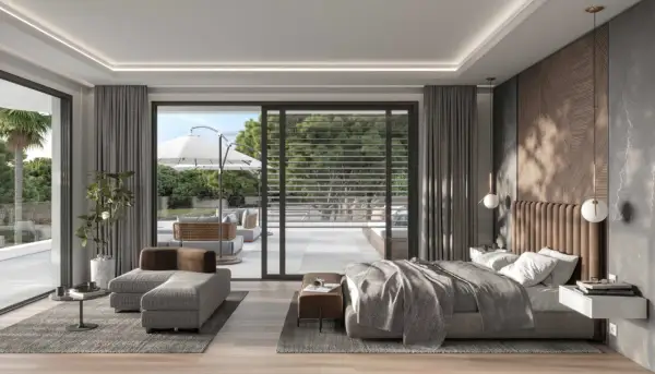 Dormitorio moderno con cama king, sofá, mesa auxiliar y acceso a terraza. La iluminación y distribución crean un ambiente de feng shui.